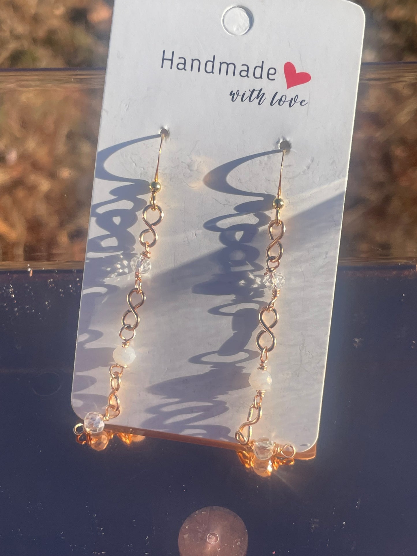 Infinity link beaded dangle earrings