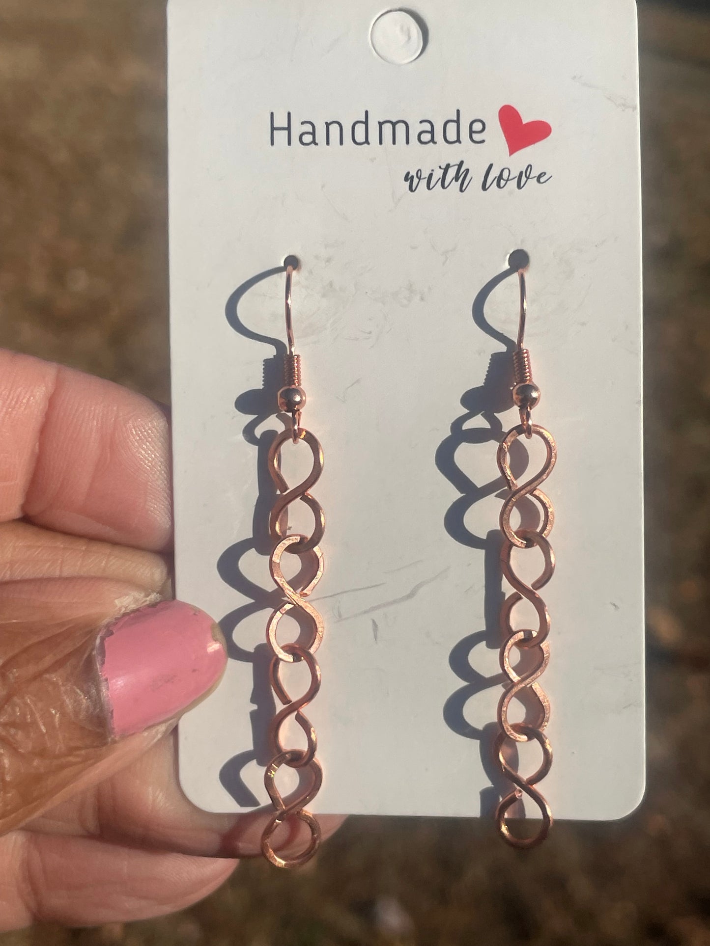 Infinity link dangle earrings