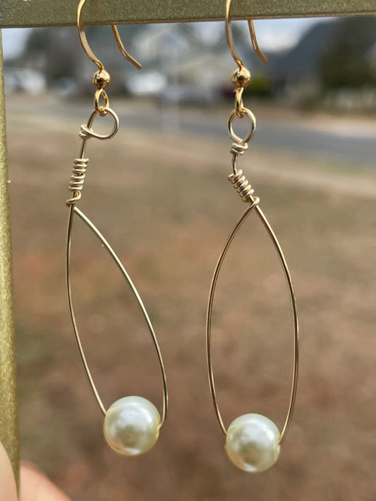 Pearl in a pod earrings